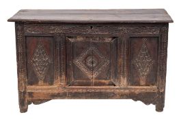 A Jacobean carved oak coffer, circa 1680,