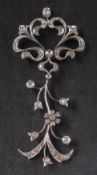 An openwork, old and single-cut diamond floral spray pendant,: total estimated diamond weight ca.