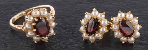 A pair of 9ct gold garnet and pearl cluster ear studs and a ring en suite,