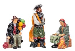 A group of three Royal Doulton figures 'Fortune Seller',