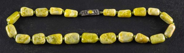 Attributed to Bernard Instone, a graduated Connemara marble bead necklace,