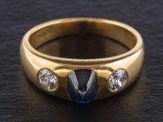 A sugarloaf-cut sapphire and old-cut diamond, three-stone ring,: estimated sapphire weight ca. 1.
