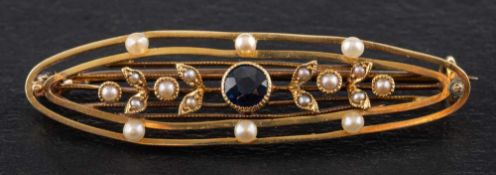 A sapphire and seed pearl openwork brooch,: estimated sapphire weight ca. 0.