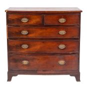 A George III mahogany bowfront chest of drawers, early 19th century,