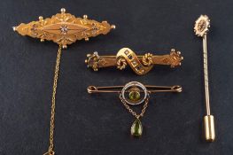 Three brooches and a tiepin,: including a 9ct gold brooch set with a rose-cut diamond, 0.