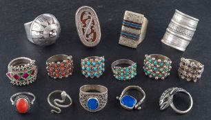 A collection of Indian rings,: set with, amongst others, vari-coloured enamel, turquoise,