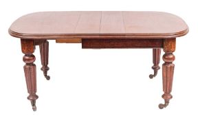 A Victorian mahogany extending dining table, third quarter 19th century,