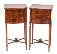 A pair of walnut bedside cabinets, early 20th century,: bowfronted,