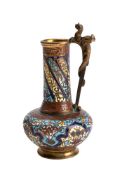A late 19th century champleve enamel small ewer: of squat form with slender neck and handle in the