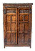 An oak cupboard in 17th century taste, circa 1900,