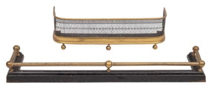 A Victorian brass and mesh fender: of rectangular outline, 89cm wide,