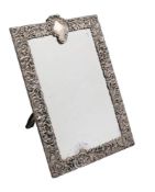 An Edward VII silver easel framed mirror, maker Goldsmiths & Silversmiths Co Ltd, London,