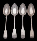 A pair of George IV silver Fiddle pattern tablespoons, maker Patrick Moore, Dublin, 1820: crested,