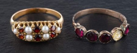 Two garnet rings,