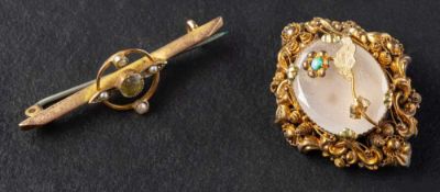 Two gemset brooches,: including a 9ct gold possibly peridot and seed pearl openwork bar brooch,