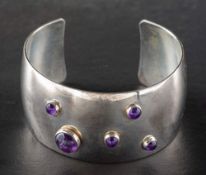Nils Erik From, a silver bangle set with cabochon-cut amethysts,: length ca. 6cm, total weight ca.
