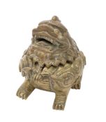 A Chinese bronze miniature incense burner: modelled as a temple lion, with hinged head, 7cm high.