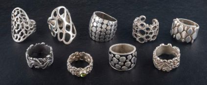 Nine modernist rings,: four of openwork design, one with maker's mark 'JDH',
