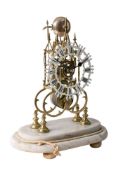 WITHDRAWN A Victorian brass English Skeleton clock: the eight-day duration,