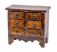 A 19th century Welsh dated slipware pottery miniature chest of drawers: attributed to the Buckley
