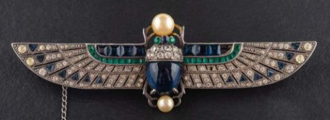 An Art Deco silver, imitation pearl, blue, green and white paste scarab brooch,: stamped '925',