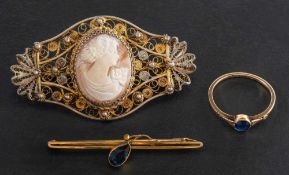 Two brooches and a ring,: including a blue paste bar brooch, stamped '9CT', length ca. 4.