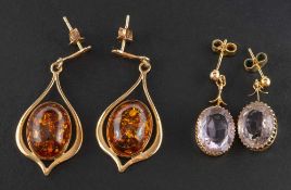 Two pairs of drop earrings,: including a pair of amber earrings,