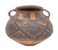 A Chinese Neolithic terracotta jar; with flattened loop handles,
