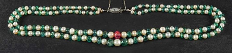 A two strand, graduated pearl, emerald and ruby bead necklace,: with marquise-cut diamond clasp,