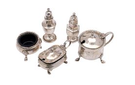 A mixed group of silver condiments, various makers and dates: includes, two pepperettes,