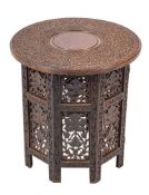 A south Asian, probably Burmese carved hardwood and brass marquetry occasional table, circa 1900,
