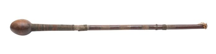 A South African tribal club: with ovoid head and wire bound shaft, 87cm long.