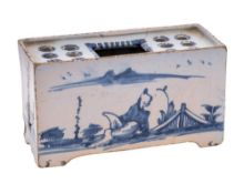 An English blue and white delftware flower brick: of small size,