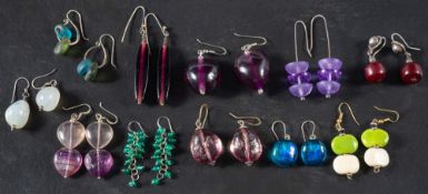 A collection of drop earrings,: including eight of vari-coloured glass,
