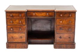 A Victorian walnut inverted breakfront desk, last quarter 19th century,