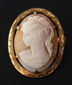 Two gemset brooches,: including a peridot bar brooch, stamped '9CT', weight ca. 2.