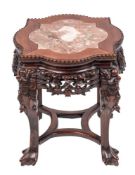 A Chinese carved and stained hardwood and marble mounted stand, late 19th century,