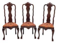 A set of eight stained hardwood dining chairs in George I style, late 19th century,
