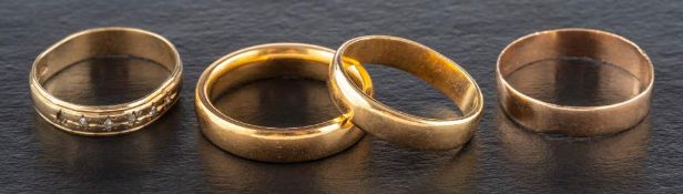 Four band rings,: including a 22ct gold band, weight ca. 6.