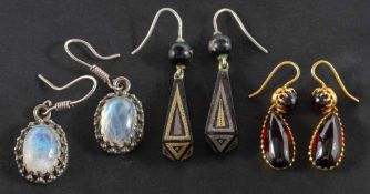 Three pairs of drop earrings,: including a pair of moonstone drop earrings,