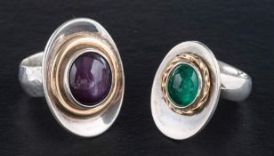 Two gemset rings,: including emerald and star sapphire, length of ring heads ca. 2.