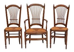 A set of eight Continental beech and rush seated dining chairs, 19th century,