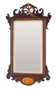 A parcel gilt mahogany framed wall mirror in George I taste, last quarter 19th century,
