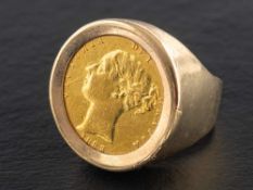A Victoria, half sovereign gold coin ring,: the coin dated 1883, the mount 9ct gold,