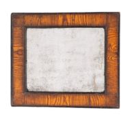 A stained wood, probably laburnum framed wall mirror, late 17th/early 18th century,: rectangular,