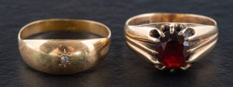 A single-cut diamond ring and a garnet ring,: a ring with estimated diamond weight ca. 0.