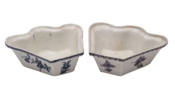 A pair of Plymouth blue and white hors d'oevres dishes: of fan shape painted with floral sprays,