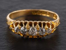 An 18ct gold, old-cut diamond, five-stone ring,: estimated total diamond weight ca. 0.