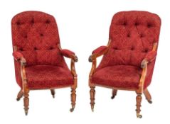 A near pair of Regency rosewood and button upholstered library elbow chairs, circa 1815,