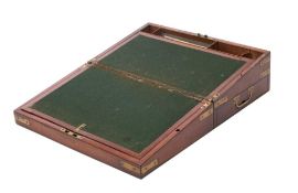 A 19th century mahogany and brass bound campaign writing slope: of rectangular outline,